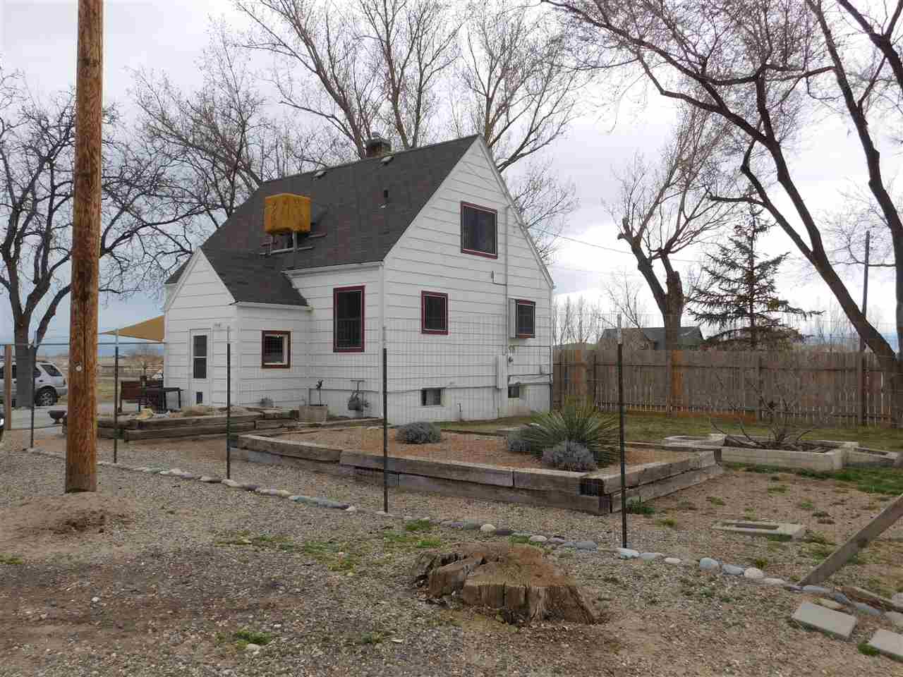1640 P Road Loma, CO 81524 - Photo 37 of 40 a view of a house with a yard