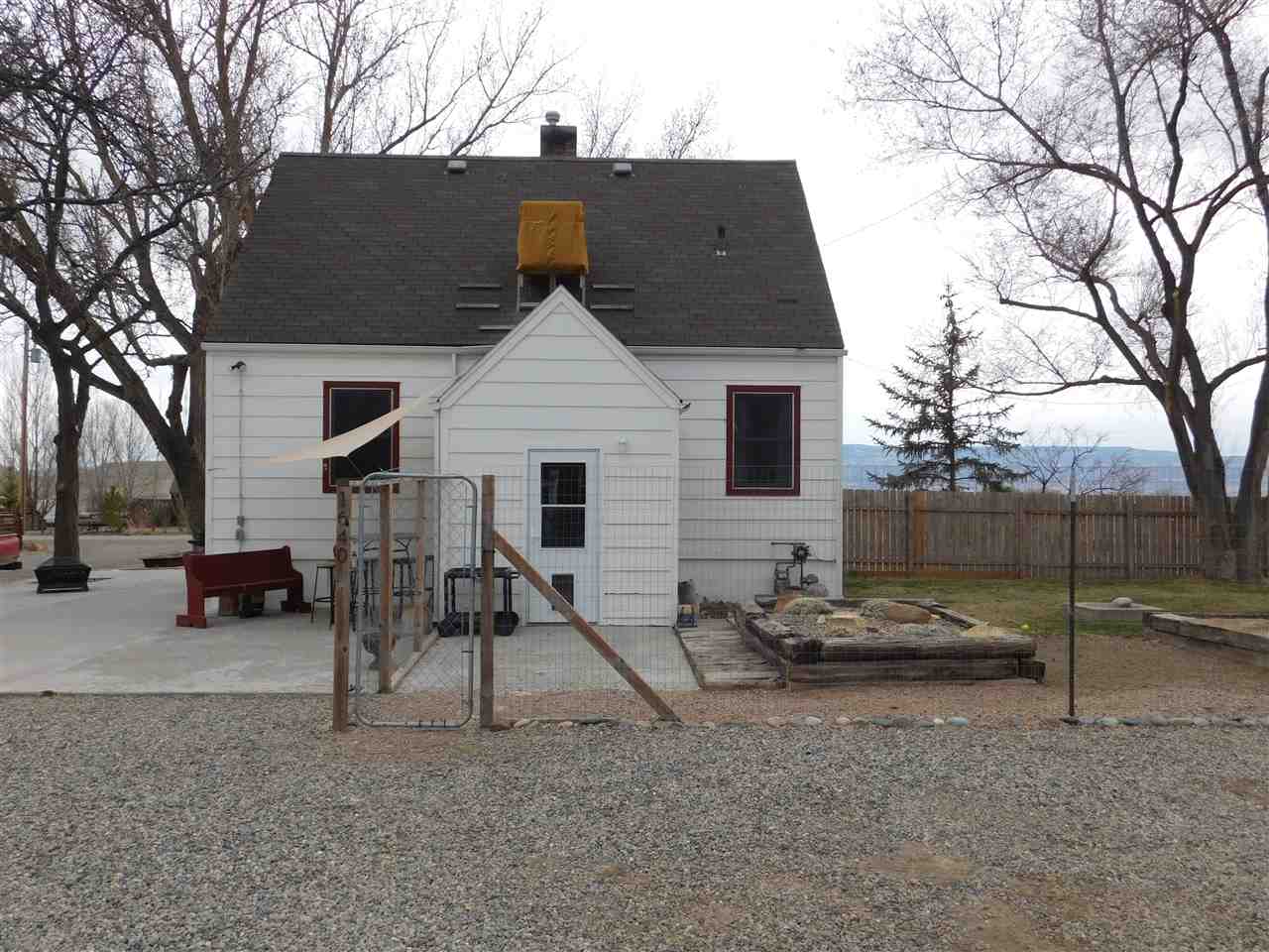 1640 P Road Loma, CO 81524 - Photo 38 of 40 a view of a house with a patio