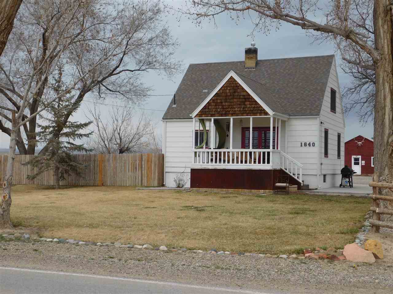 1640 P Road Loma, CO 81524 - Photo 39 of 40 a view of a house with a yard