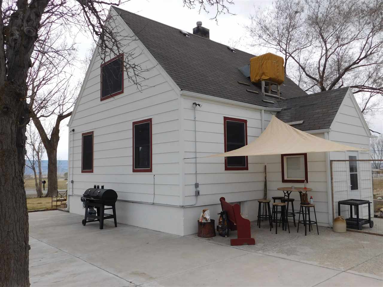 1640 P Road Loma, CO 81524 - Photo 4 of 40 a backyard of a house with outdoor seating