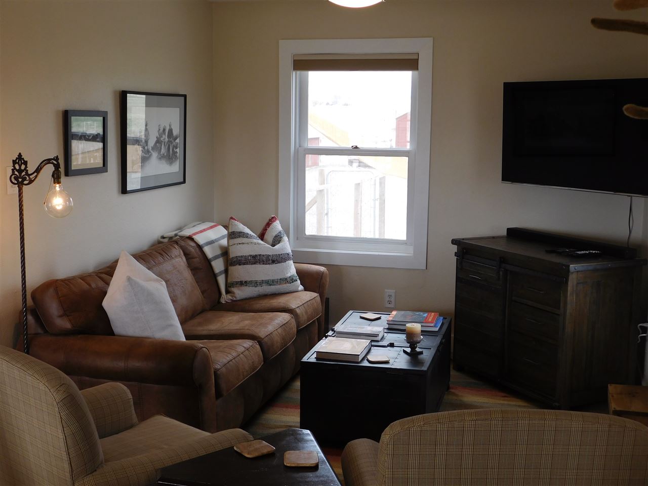 1640 P Road Loma, CO 81524 - Photo 6 of 40 a living room with furniture and a flat screen tv