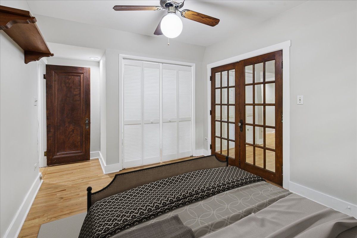 734 West Wrightwood Avenue, Unit B Chicago, IL 60614 - Photo 16 of 21 a view of a livingroom with wooden floor and a ceiling fan