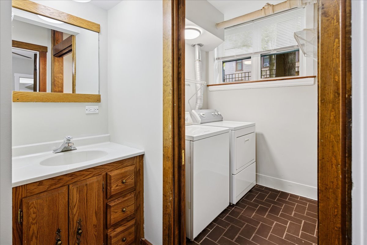 734 West Wrightwood Avenue, Unit B Chicago, IL 60614 - Photo 17 of 21 a utility room with a sink washer and dryer