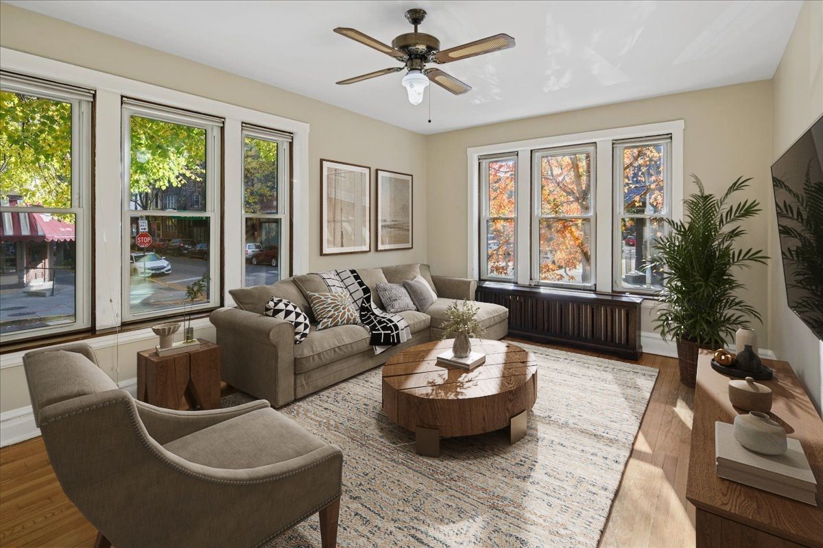 734 West Wrightwood Avenue, Unit B Chicago, IL 60614 - Photo 2 of 21 a living room with furniture and a large window