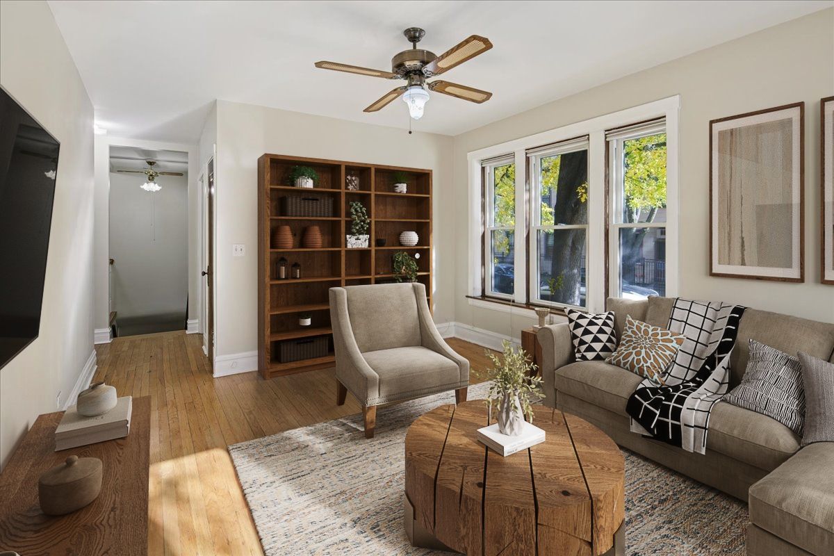 734 West Wrightwood Avenue, Unit B Chicago, IL 60614 - Photo 3 of 21 a living room with furniture and a flat screen tv