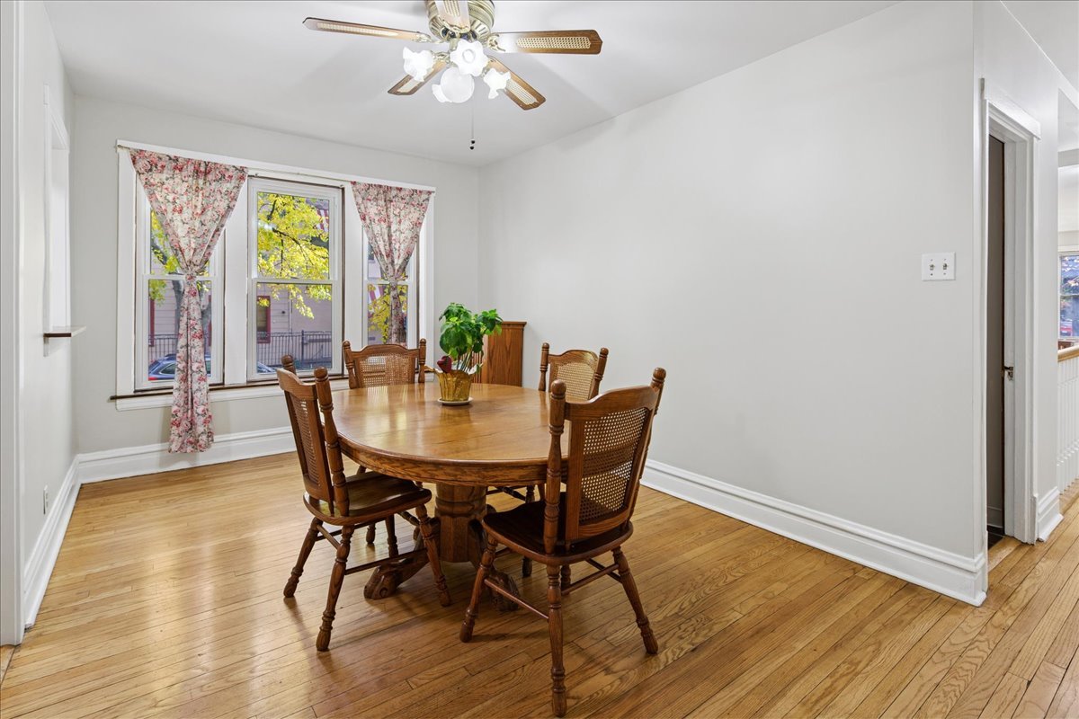 734 West Wrightwood Avenue, Unit B Chicago, IL 60614 - Photo 5 of 21 a view of a dining room with furniture window and wooden floor