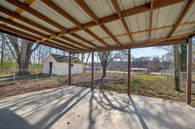 a view of a backyard of a house