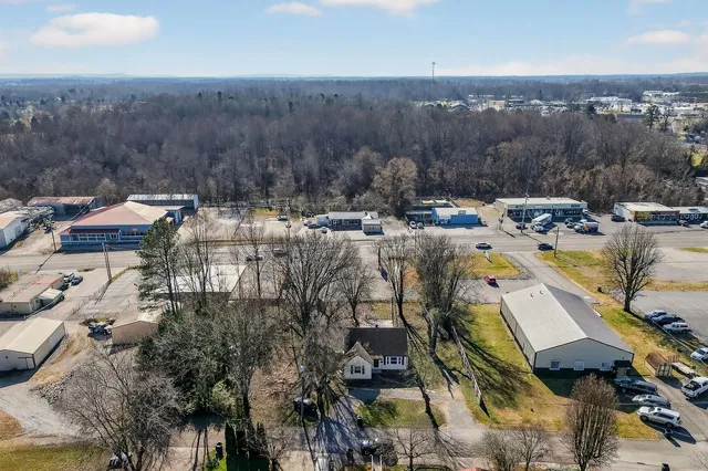 a view of yard and swimming pool