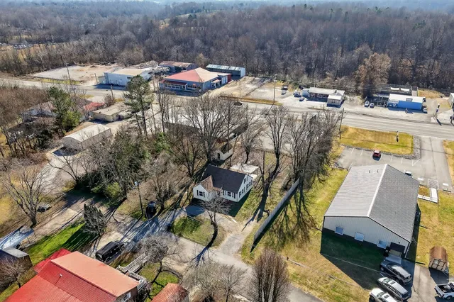 a view of a chairs and table on the wooden floor