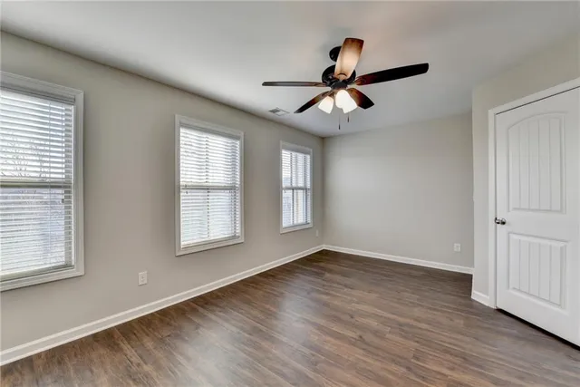 a view of room window and wooden floor