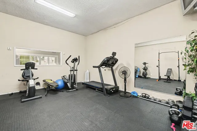 a view of a room with gym equipment