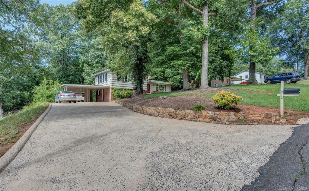 912 Parkwood Road Shelby, NC 28150 - Photo 2 of 23 a house with tree in front of it