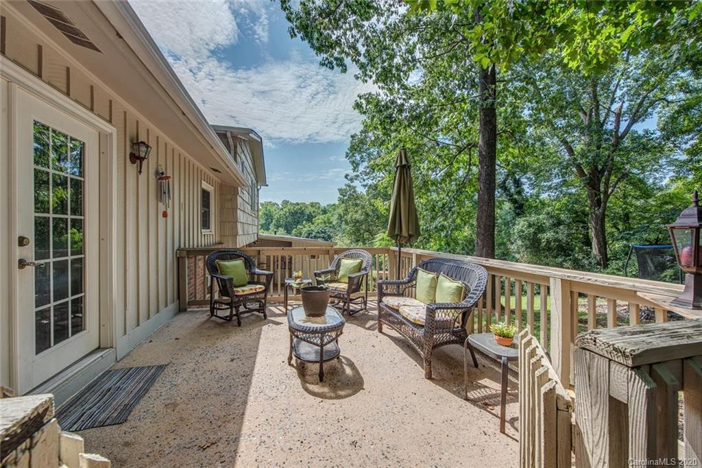 912 Parkwood Road Shelby, NC 28150 - Photo 21 of 23 a view of balcony with chairs and wooden fence