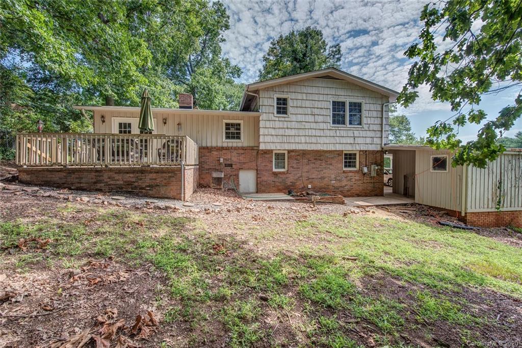 912 Parkwood Road Shelby, NC 28150 - Photo 22 of 23 a front view of a house with a yard and garage
