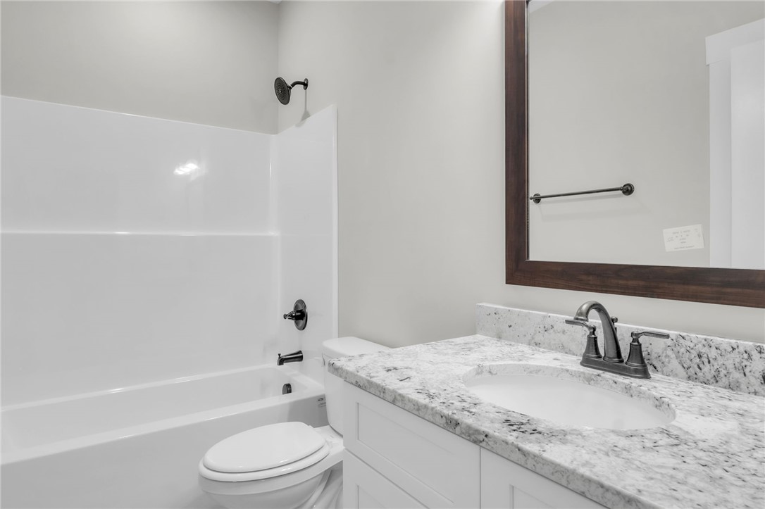 121 Ashley Drive Pelzer, SC 29669 - Photo 21 of 25 Bathroom with washtub / shower combination and vanity