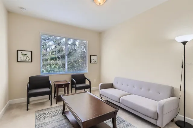 a room with furniture and a window