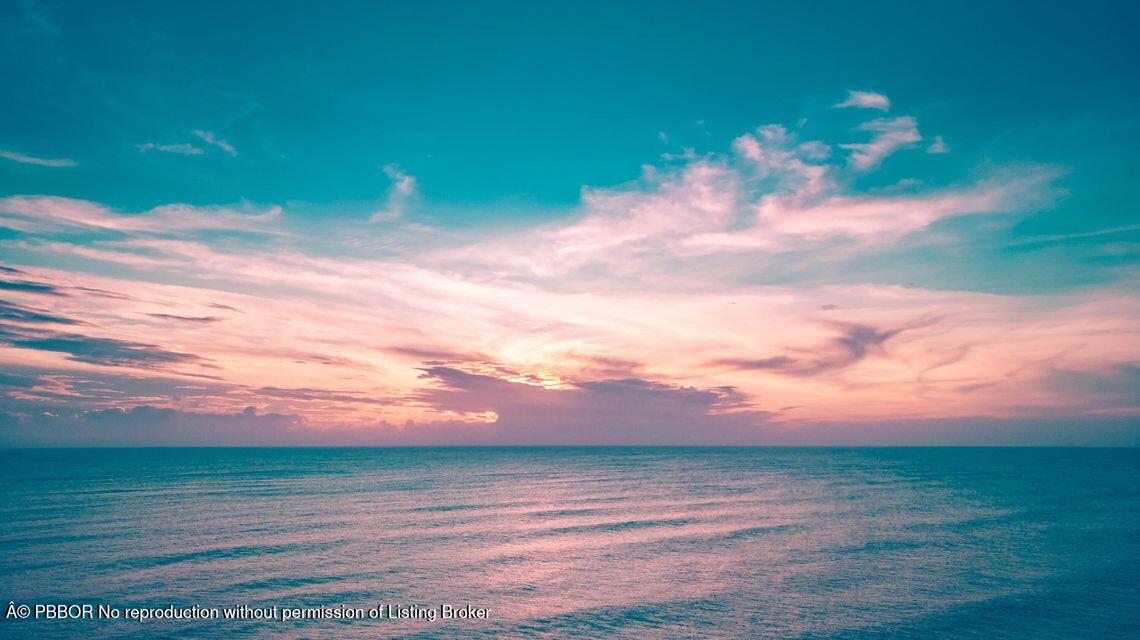 400 South Beach Road, Unit 504 Tequesta, FL 33469 - Photo 12 of 22 a view of a yard with sunset view