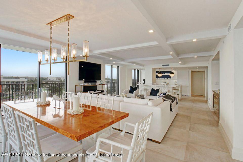 400 South Beach Road, Unit 504 Tequesta, FL 33469 - Photo 8 of 22 a view of a dining room and livingroom with furniture wooden floor a chandelier