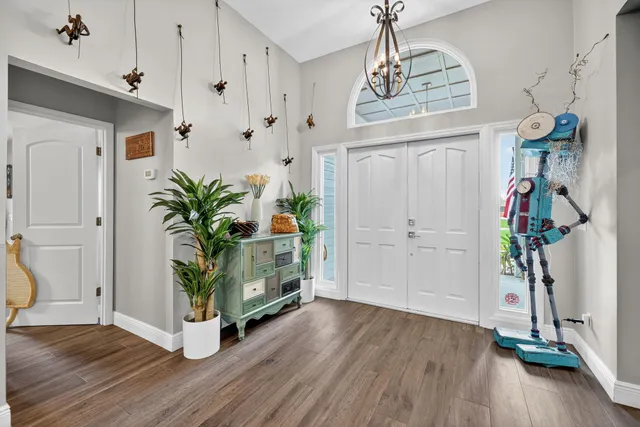 a view of entryway with wooden floor