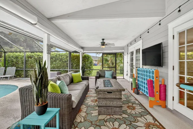a view of a dining room with furniture window and outside view