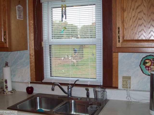 515 Lakedale Road Colfax, NC 27235 - Photo 13 of 16 Kitchen. Window over sink