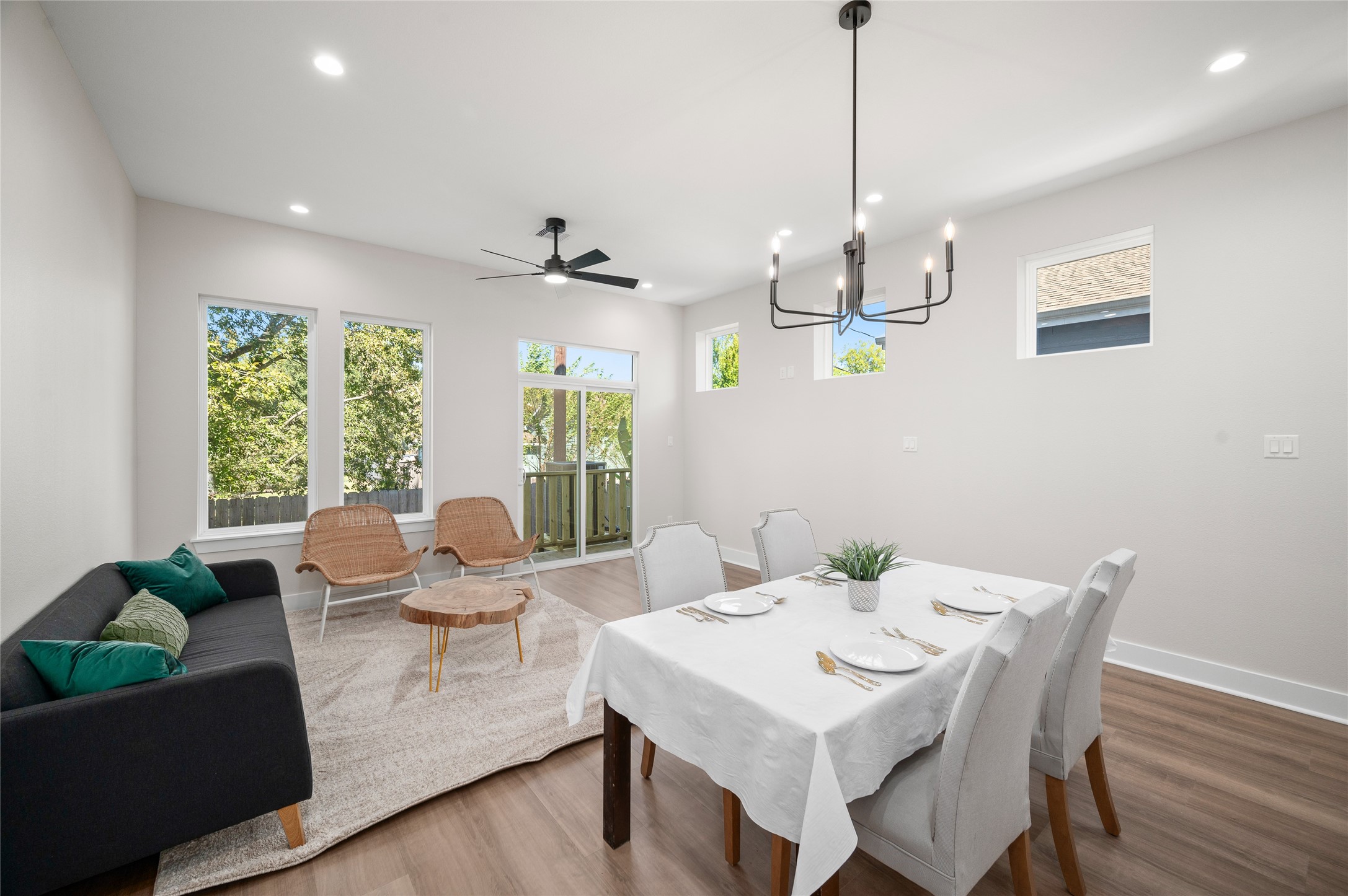 921 East 38th Street Houston, TX 77022 - Photo 16 of 40 a view of a dining room with furniture window and wooden floor