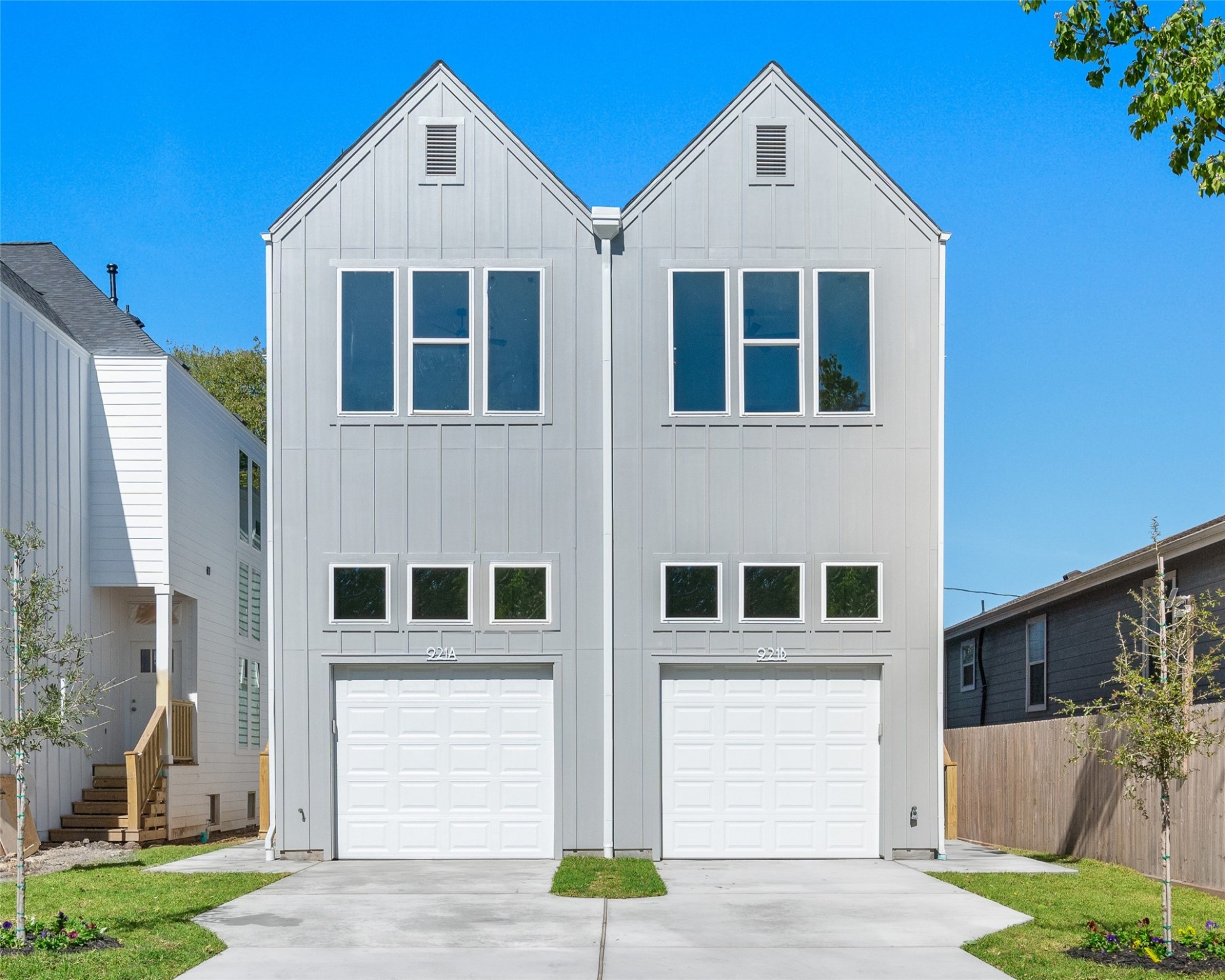 921 East 38th Street Houston, TX 77022 - Photo 2 of 40 a view of a brick house with large windows