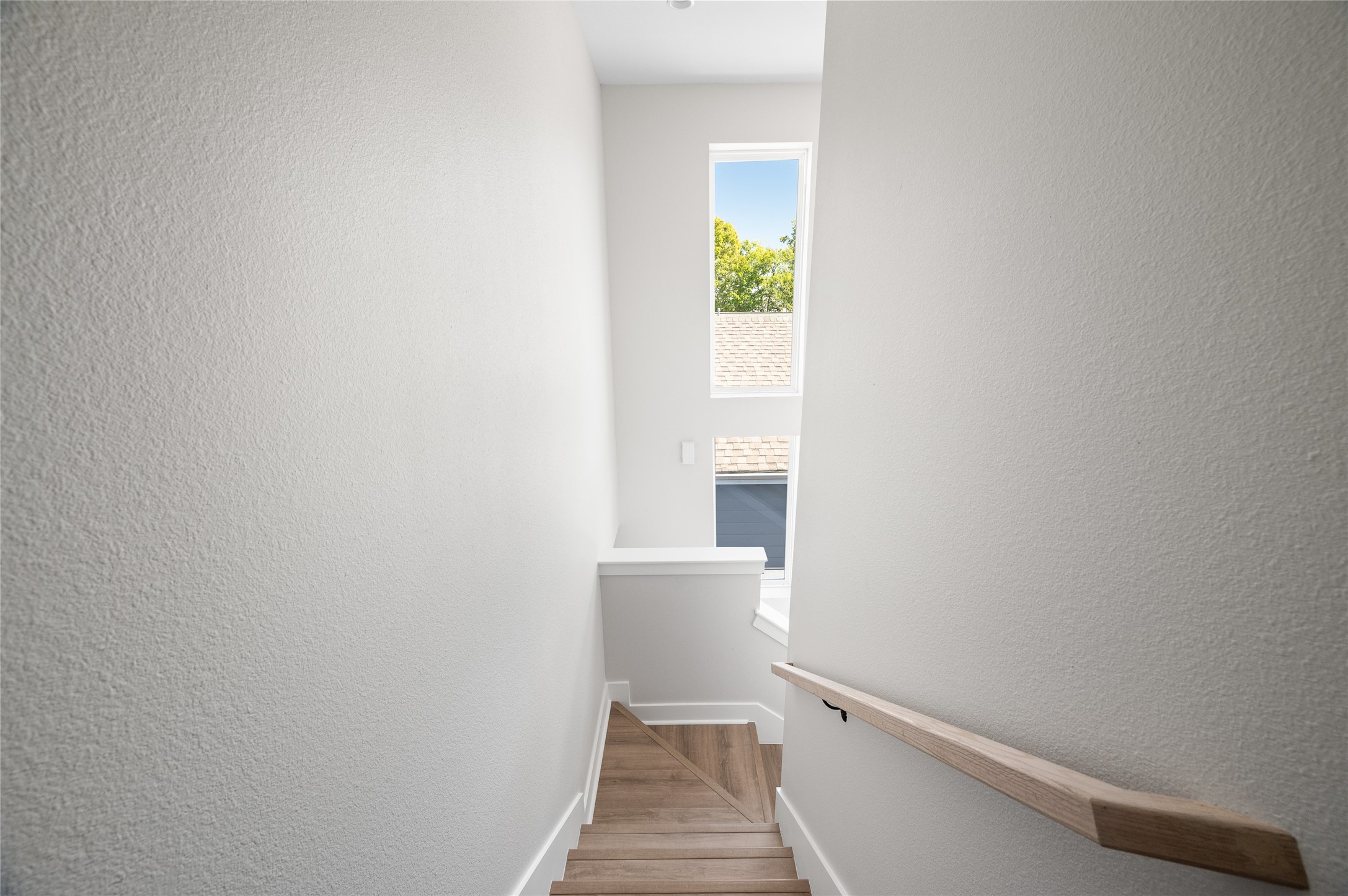 921 East 38th Street Houston, TX 77022 - Photo 33 of 40 a view of a hallway with wooden floor