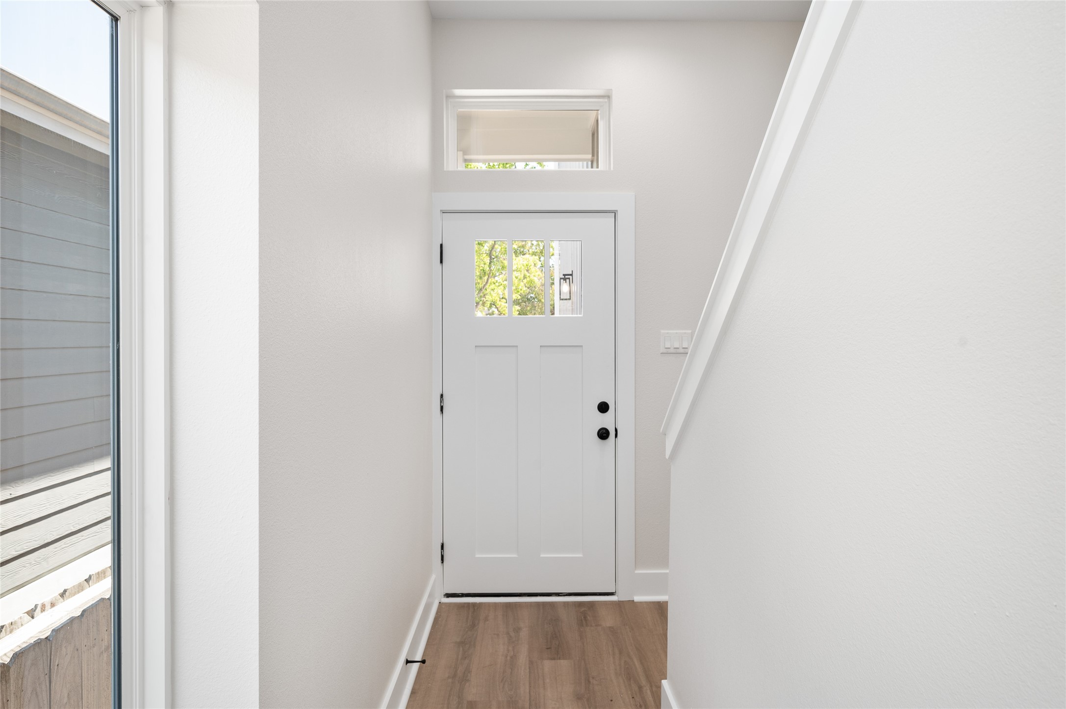 921 East 38th Street Houston, TX 77022 - Photo 4 of 40 a view of room with window and stairs