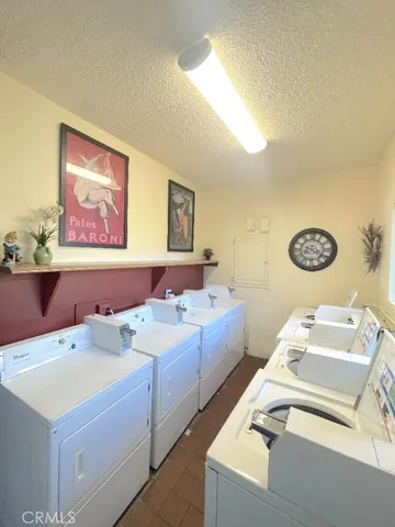 a view of bathroom with dual sinks