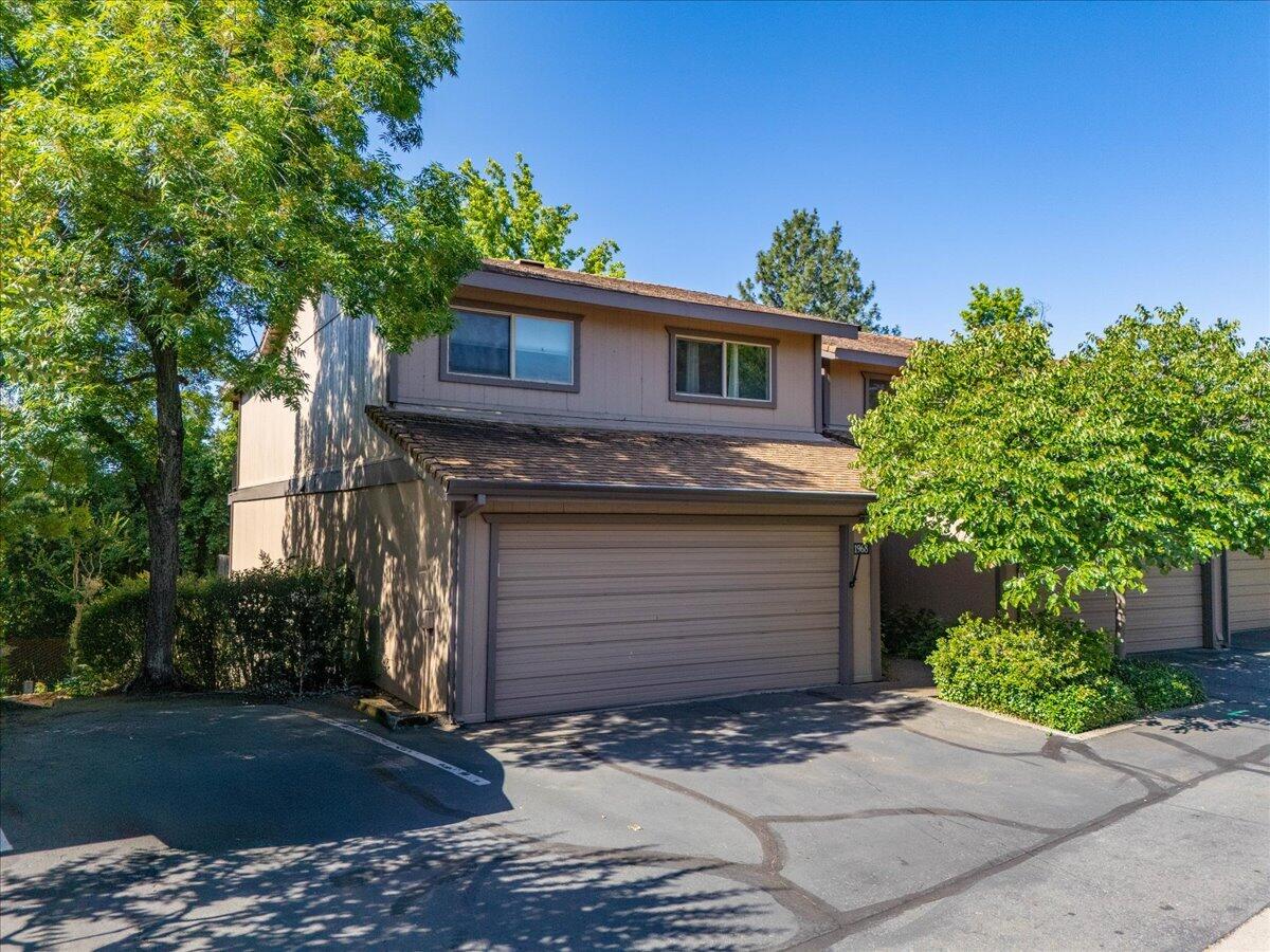 1968 Bechelli Lane Redding, CA 96002 - Photo 32 of 32 a front view of a house with a yard