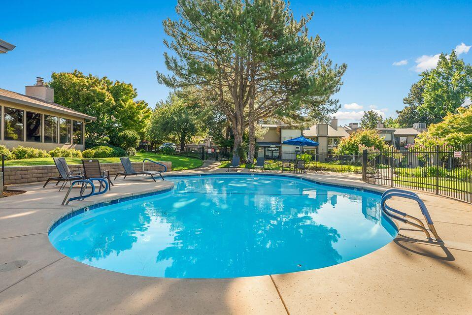 1968 Bechelli Lane Redding, CA 96002 - Photo 4 of 32 a view of a swimming pool with outdoor seating