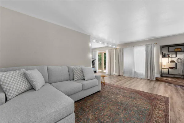 a living room with furniture and a couch