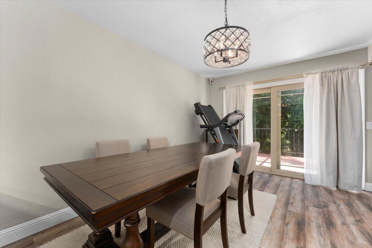 1968 Bechelli Lane Redding, CA 96002 - Photo 7 of 32 a view of a dining room with furniture window and outside view