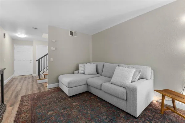 a living room with furniture and a couch