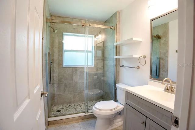 a view of a barn with a yard