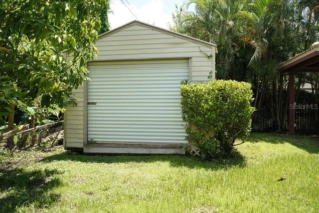 a front view of a house with garage