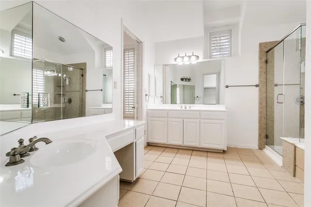 a bathroom with a sink a vanity and a mirror