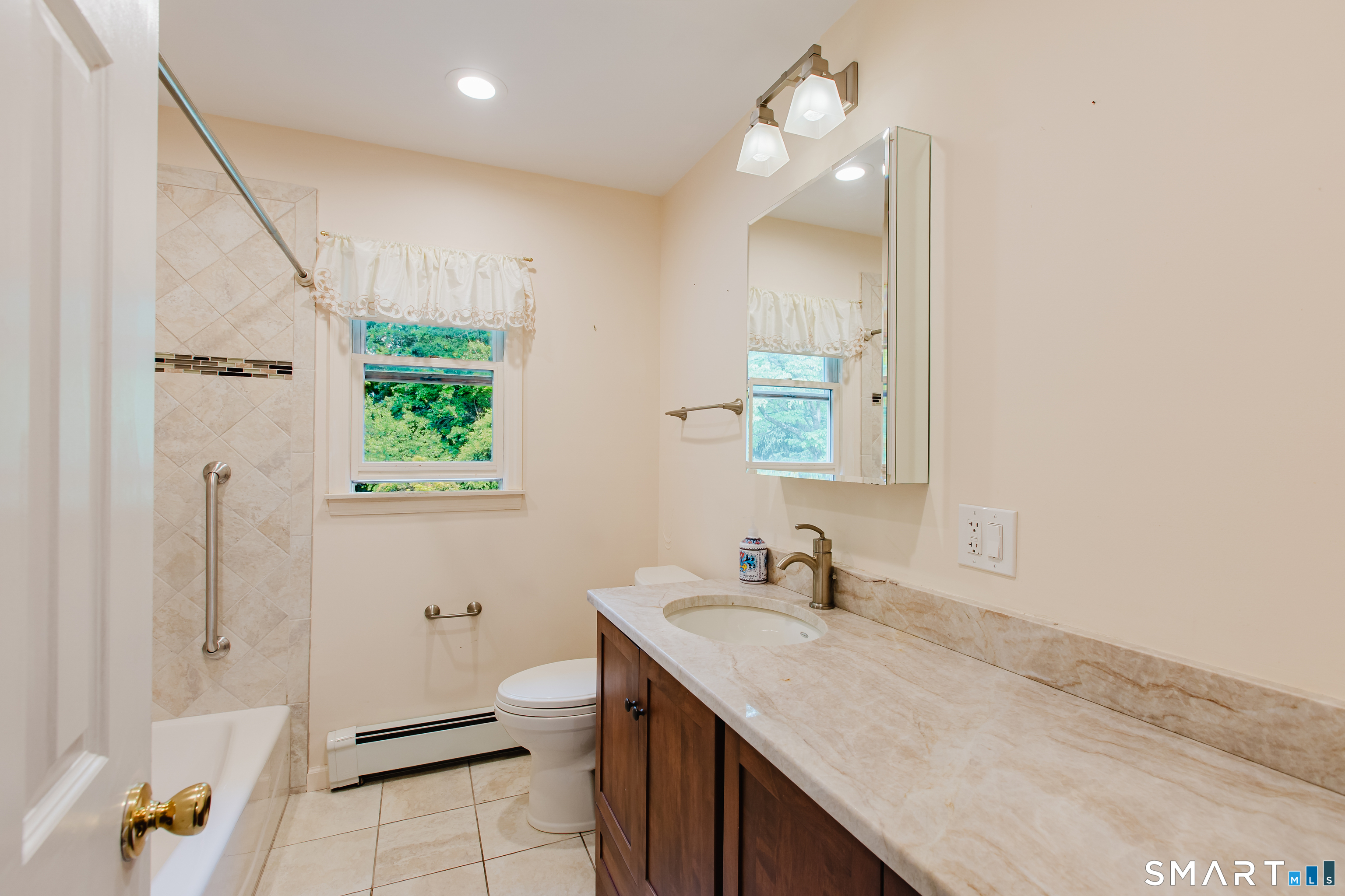 75 Westwood Road Stamford, CT 06902 - Photo 22 of 40 Large Full Bathroom w/ double vanity & tub/shower