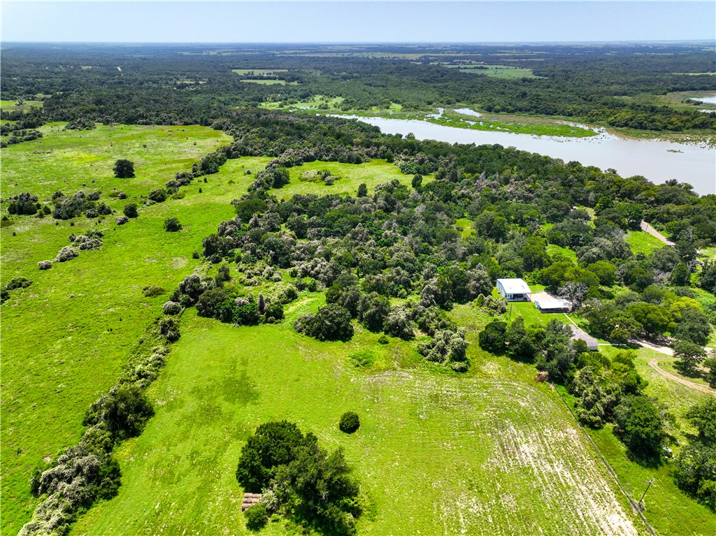 371 Redbud A Groesbeck, TX 76642 - Photo 5 of 13 a view of a lush green forest with trees and houses