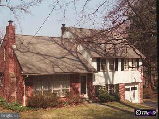 605 Pugh Road Wayne, PA 19087 - Photo 1 of 1 a front view of a house with garage