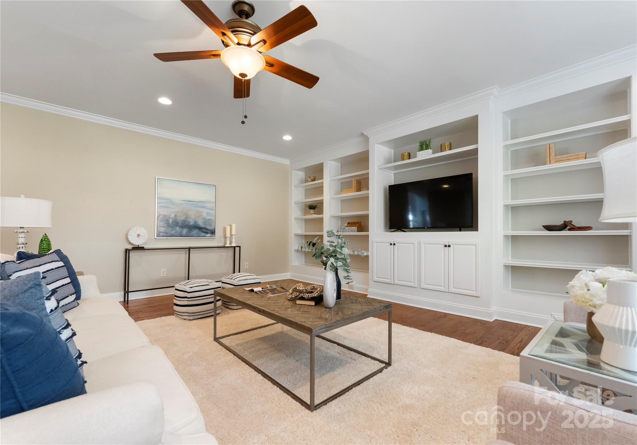 2105 Lanier Avenue Charlotte, NC 28205 - Photo 16 of 31 a living room with furniture and a flat screen tv