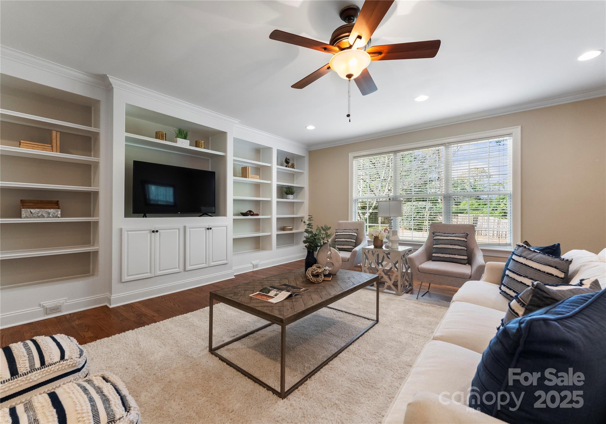 2105 Lanier Avenue Charlotte, NC 28205 - Photo 17 of 31 a living room with furniture windows and a flat screen tv