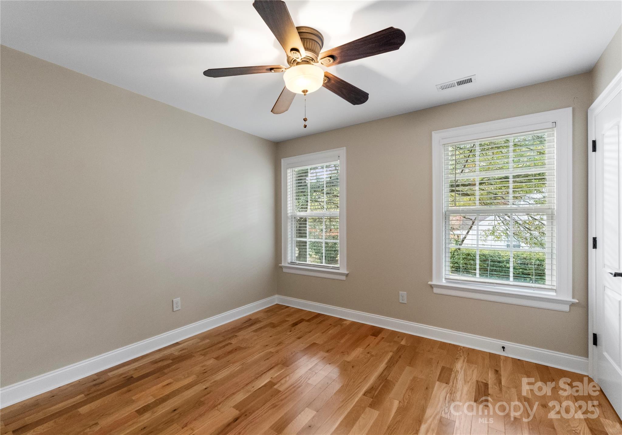 2105 Lanier Avenue Charlotte, NC 28205 - Photo 25 of 31 a view of an empty room with a window