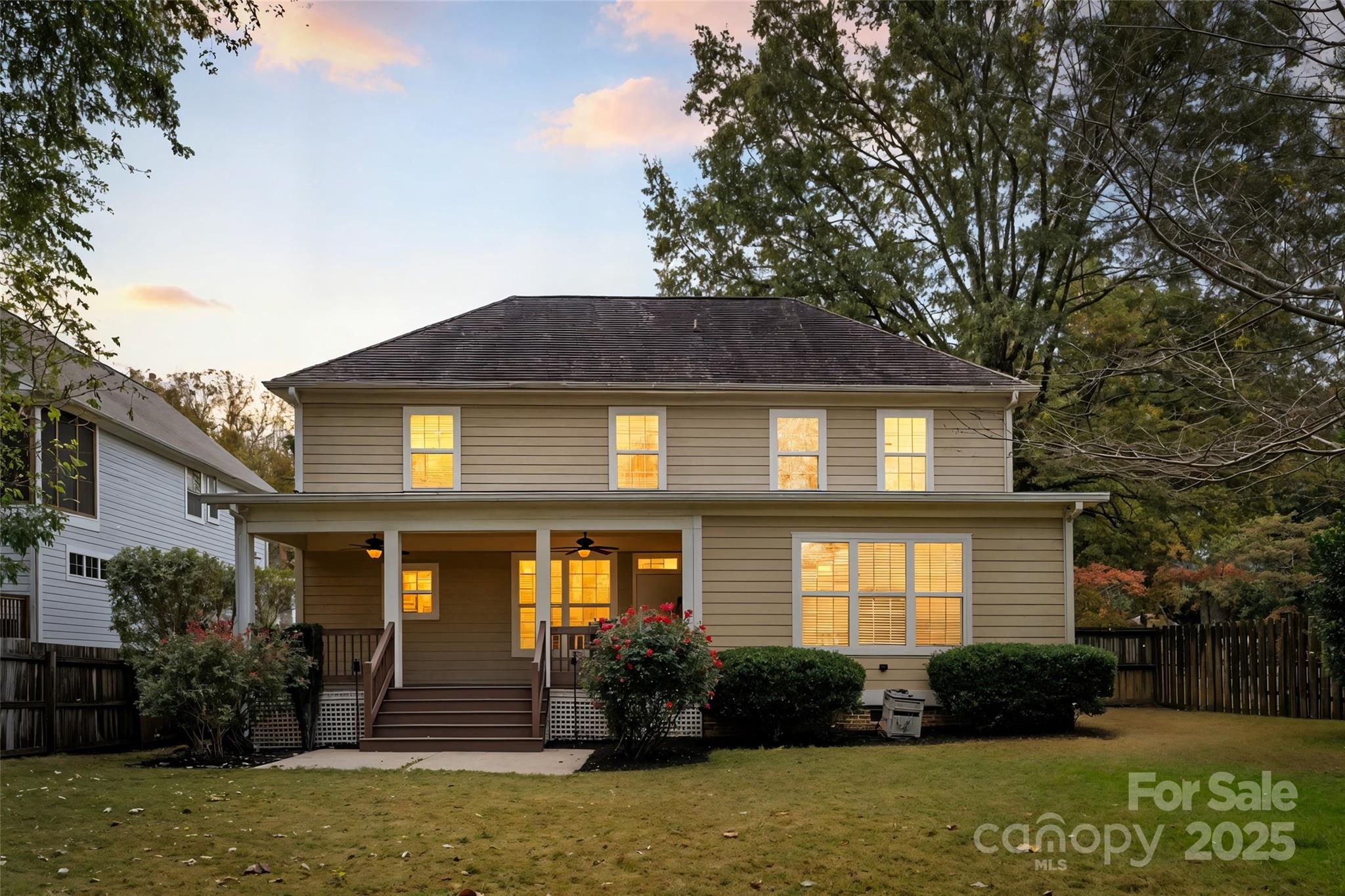 2105 Lanier Avenue Charlotte, NC 28205 - Photo 6 of 31 a front view of a house with garden