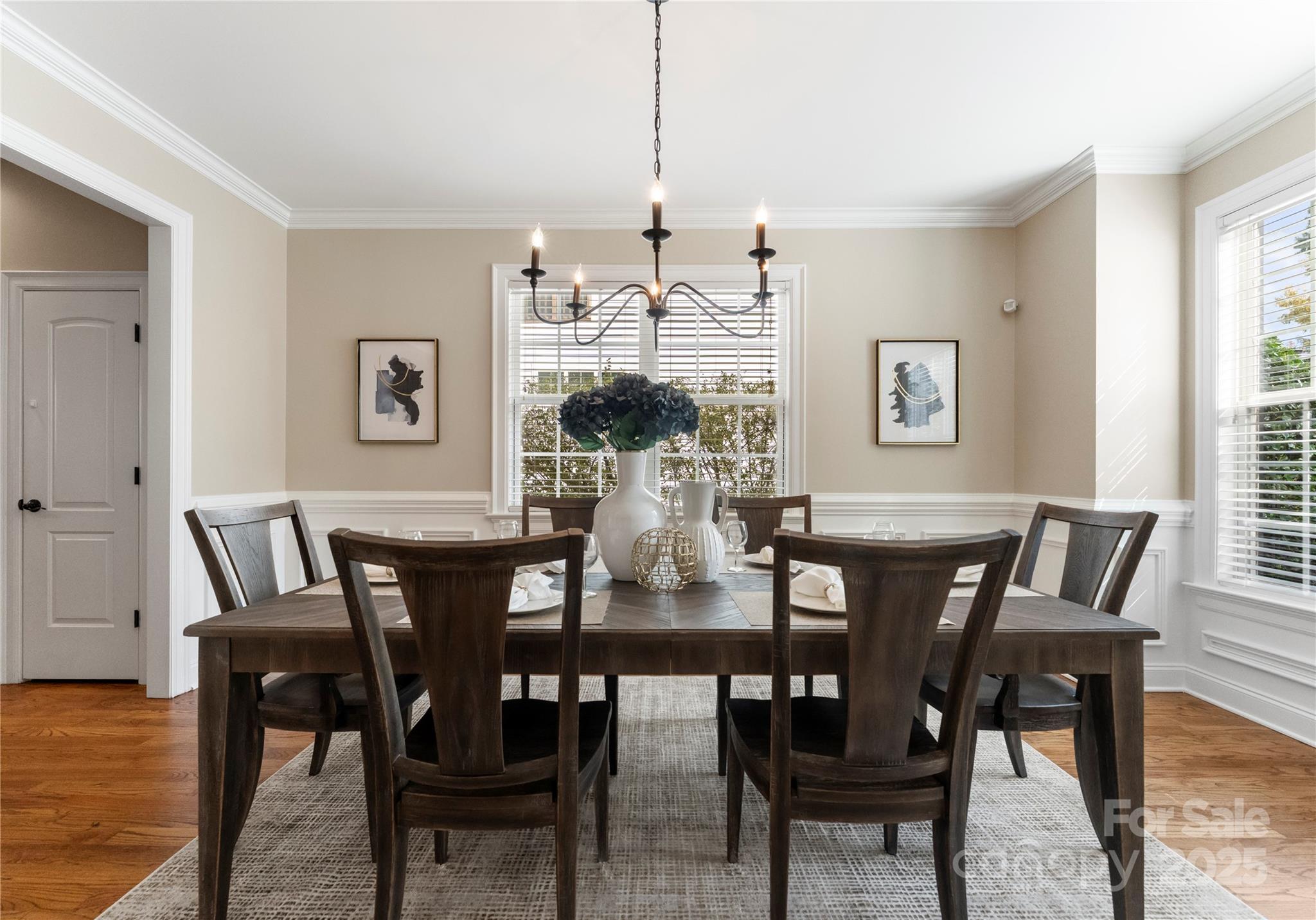 2105 Lanier Avenue Charlotte, NC 28205 - Photo 8 of 31 a view of a dining room with furniture window and wooden floor
