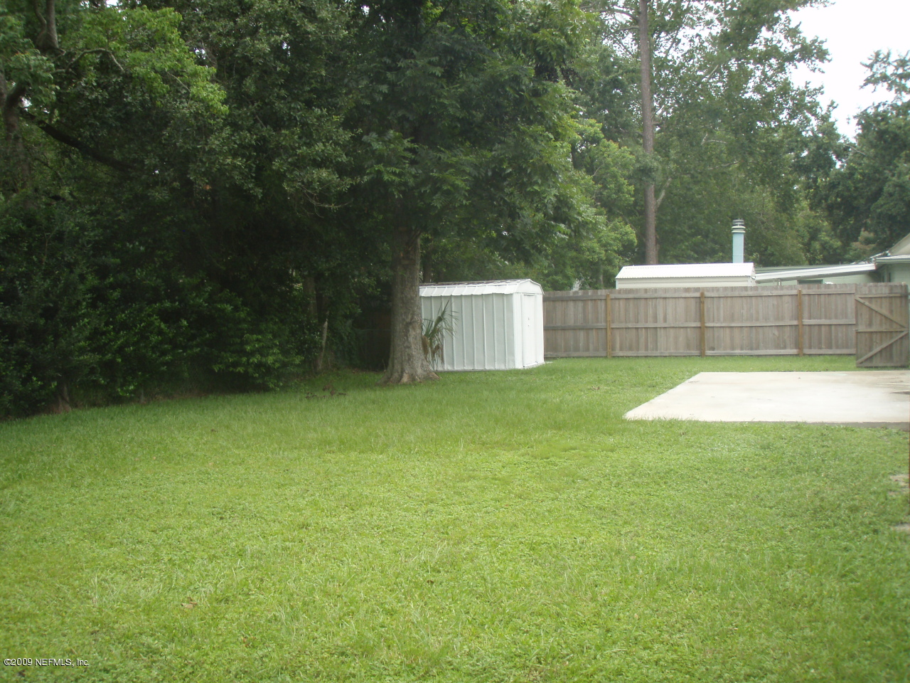 4238 Glenview Road Jacksonville, FL 32207 - Photo 5 of 6 a view of a backyard