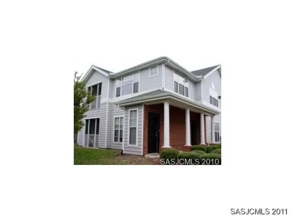a black and white photo of a house