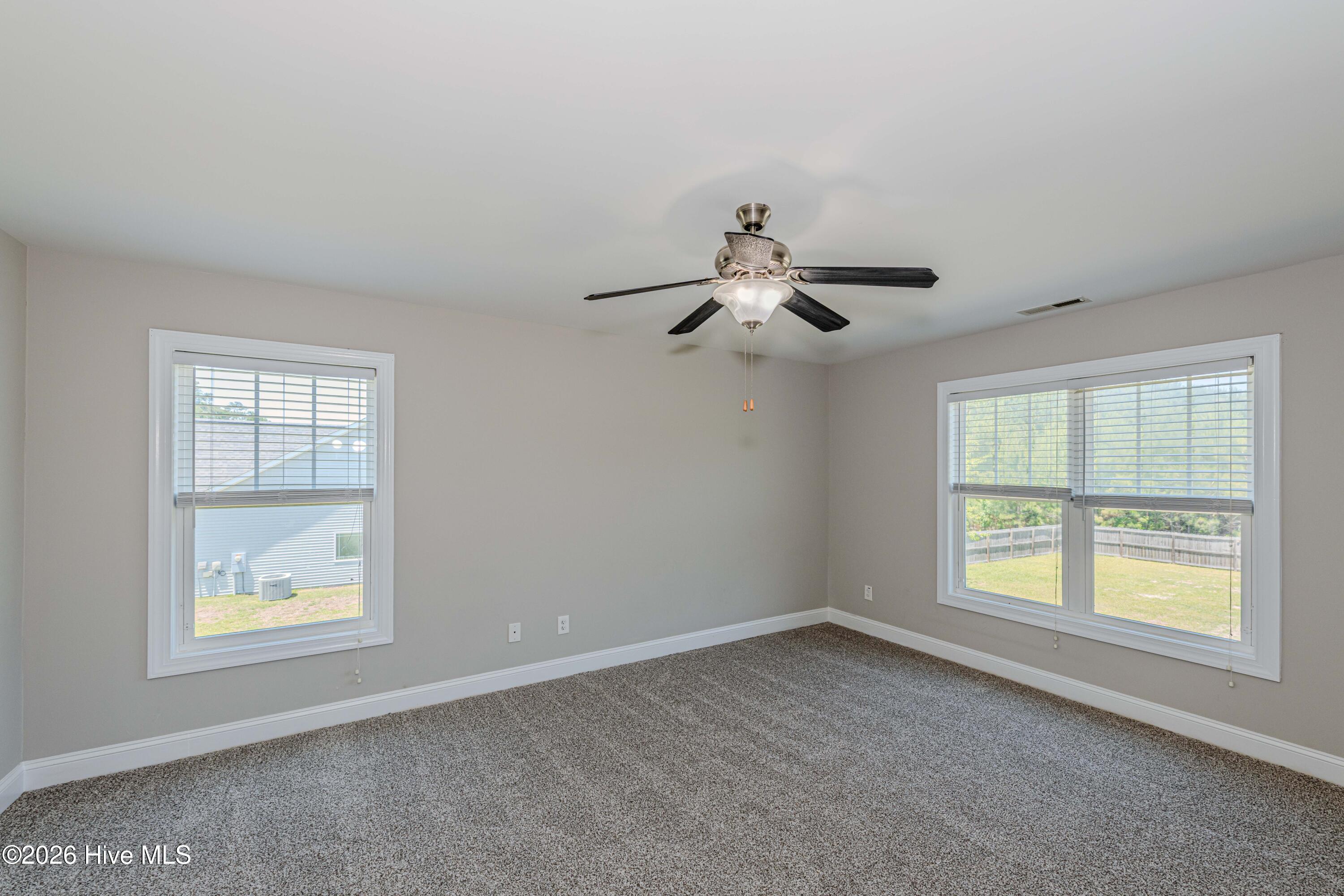 673 Morris Landing Road Holly Ridge, NC 28445 - Photo 71 of 125 Primary bedroom