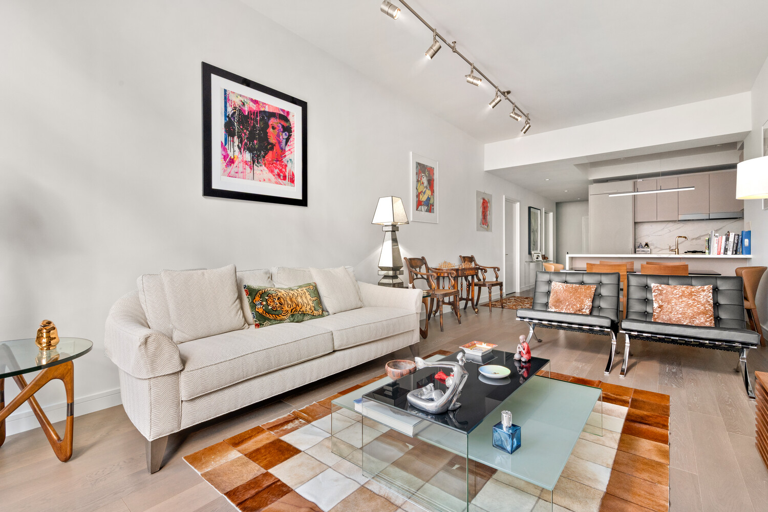 305 East 51st Street, Unit RU5H Manhattan, NY 10022 - Photo 10 of 14 a living room with furniture and a rug